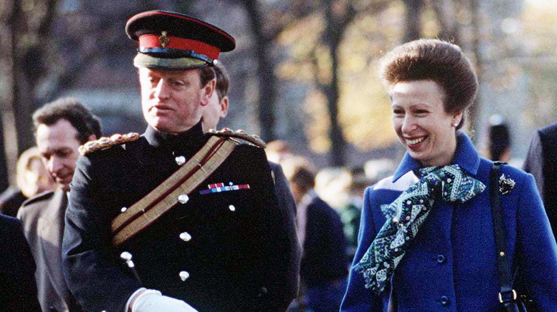 Andrew Parker Bowles talking while Princess Anne smiles