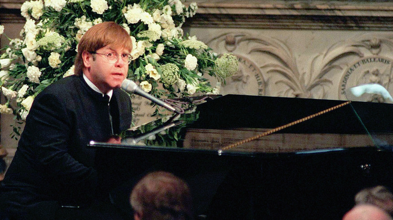 Elton John at funeral