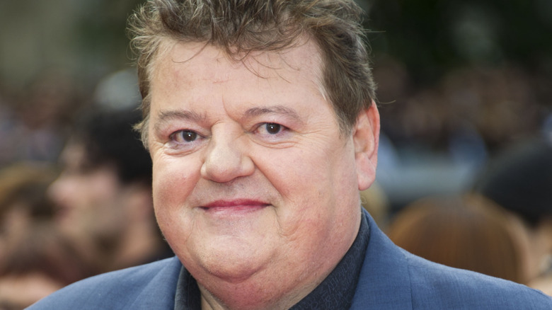 Robbie Coltrane in blue blazer 