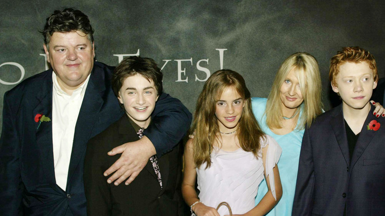 Robbie Coltrane with Daniel Radcliffe, Emma Watson