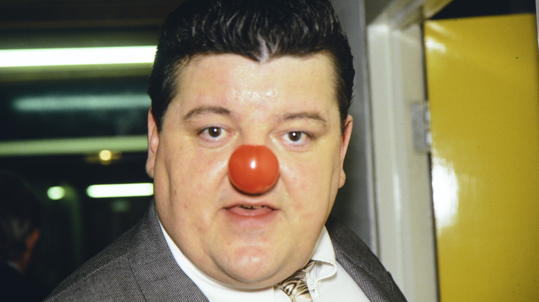 Robbie Coltrane with red nose 