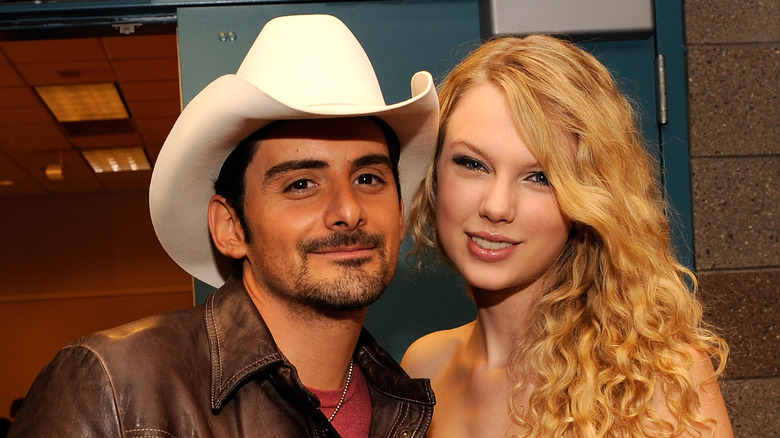 Taylor Swift and Brad Paisley smiling