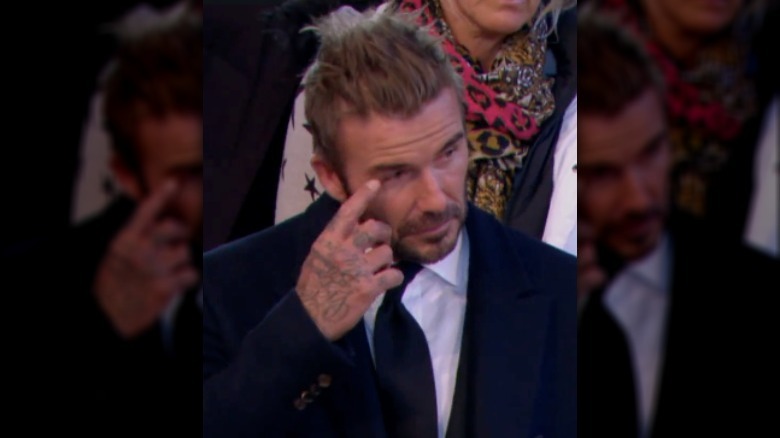 David Beckham crying while viewing queen's coffin