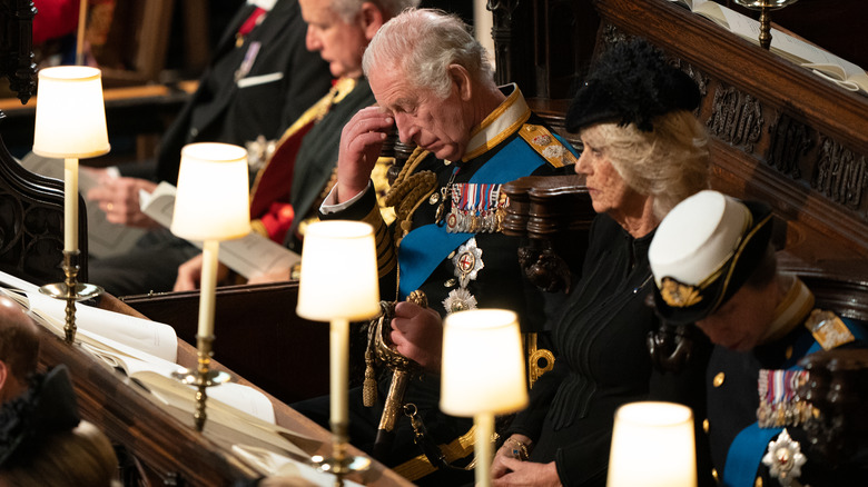 King Charles wiping tears at queen's funeral