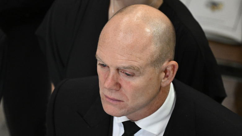 Mike Tindall looking ashen at the queen's funeral