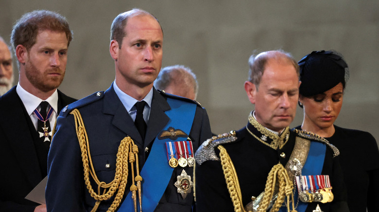 royal family with sad expressions 