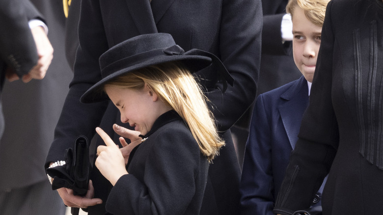 Princess Charlotte crying at queen's funeral