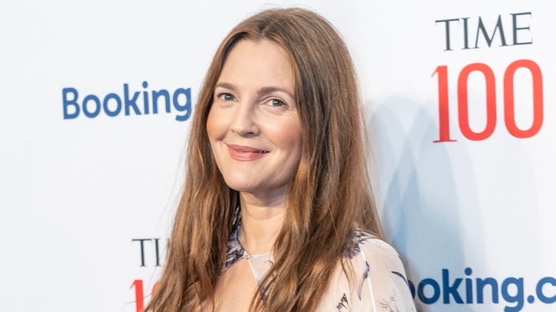 Drew Barrymore smiling at a red carpet event