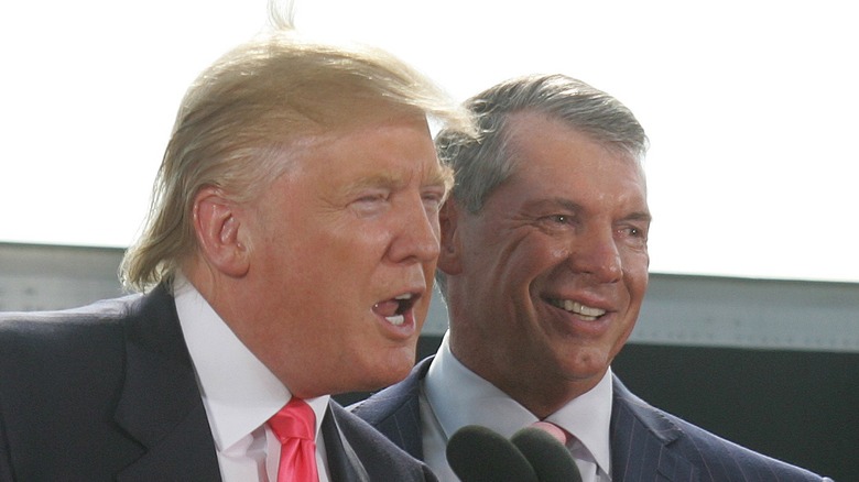 Vince McMahon smiling next to Donald Trump