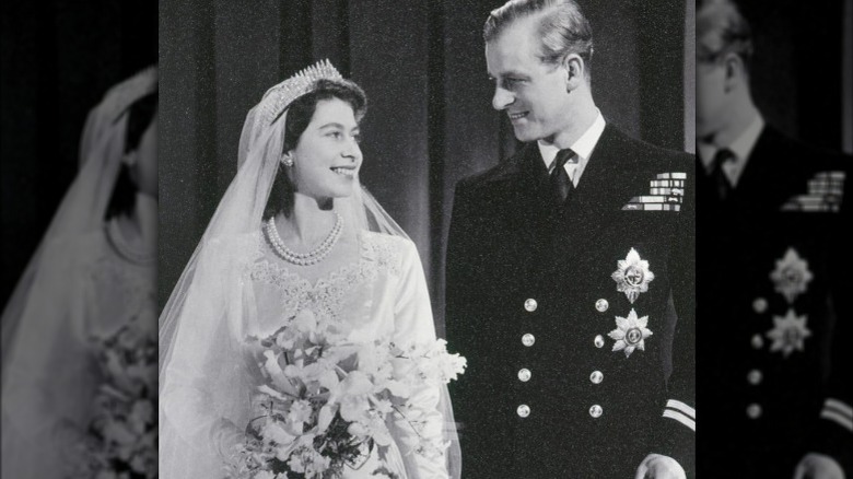 Queen Elizabeth and Prince Philip smiling