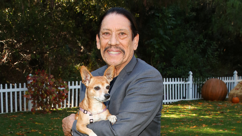 Danny Trejo with a dog
