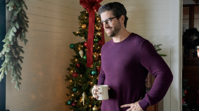 Jackson smiling with mug in A Southern Family Christmas