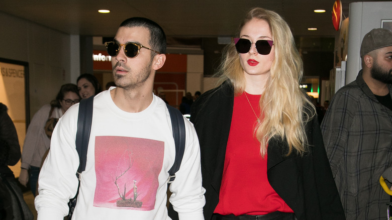 Joe Jonas and Sophie Turner walking