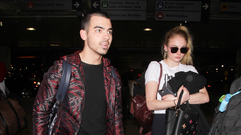 Joe Jonas and Sophie Turner walking