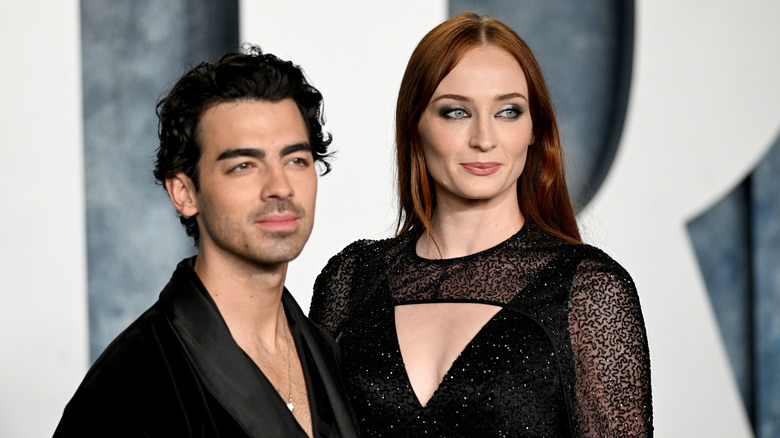 Sophie Turner and Joe Jonas posing for photos