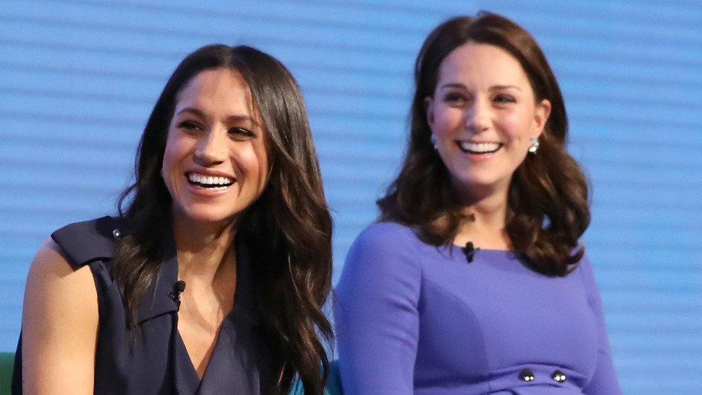 Meghan Markle and Kate Middleton laughing