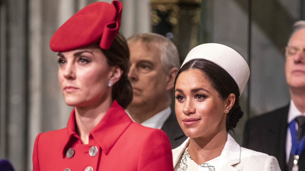 Kate Middleton and Meghan Markle walking