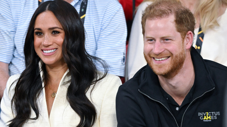 Harry and Meghan smiling 