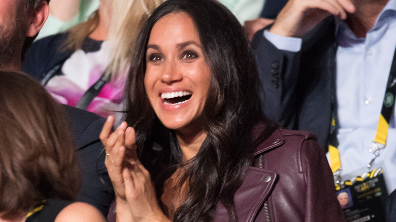 Meghan Markle applauding