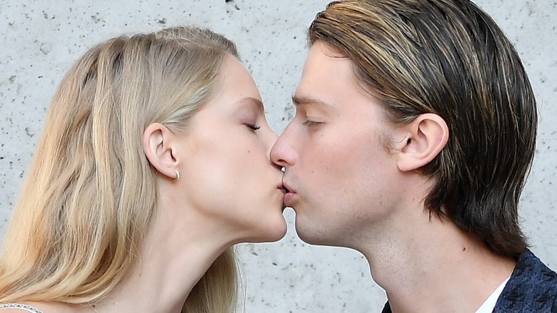 Abby Champion and Patrick Schwarzenegger kissing