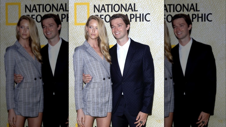 Abby Champion and Patrick Schwarzenegger posing