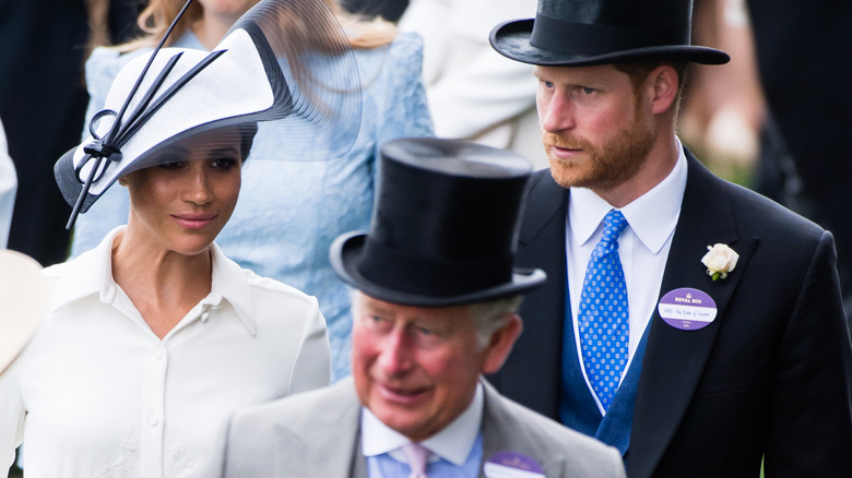 King Charles, Harry, and Meghan closeup