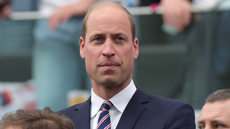 Prince William looking on