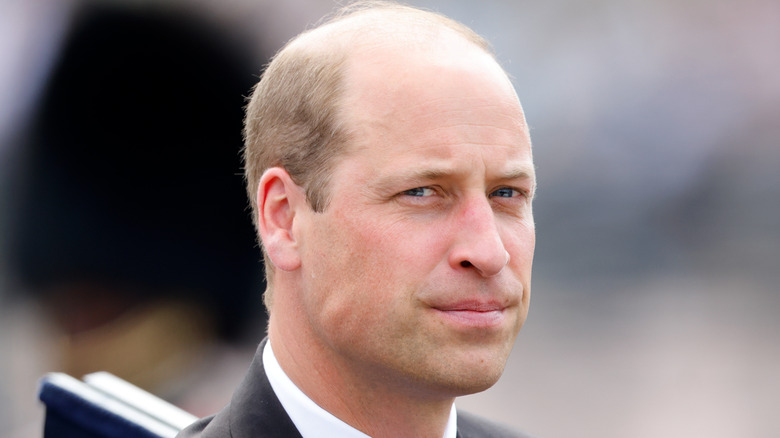 Prince William looking on