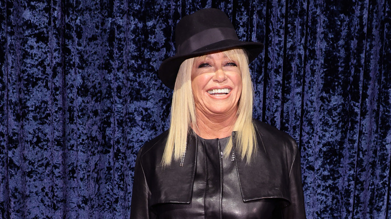 Suzanne Somers wearing hat, smiling