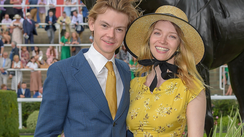 Thomas Brodie-Sangster and Talulah Riley posing 