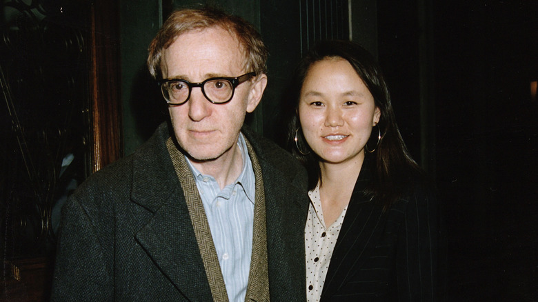 Woody Allen and Soon-Yi Previn posing 