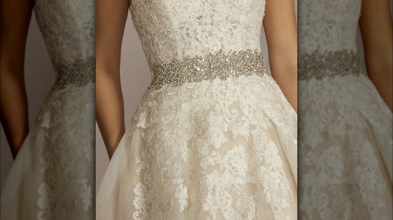 Lace wedding dress with belt