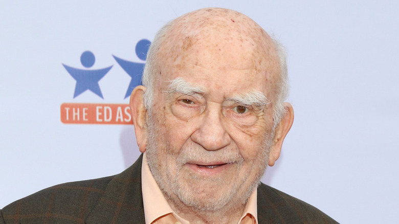 Ed Asner on a red carpet 