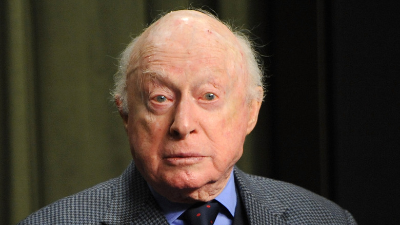 Norman Lloyd staring