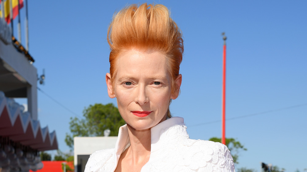 Tilda Swinton posing outside