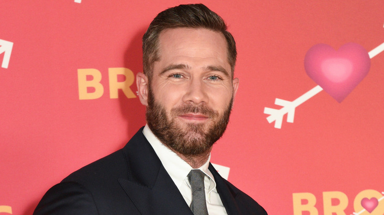 Luke Macfarlane smiling