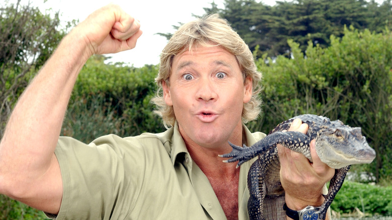 Steve Irwin posing with crocodile