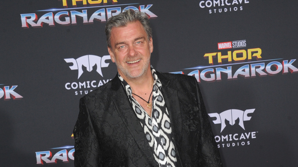 Ray Stevenson smiling for cameras