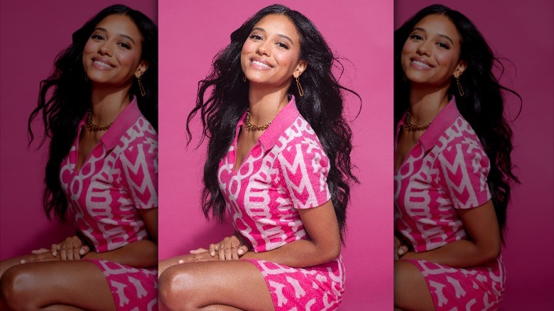 Jonetta Kaiser smiling in pink and white outfit