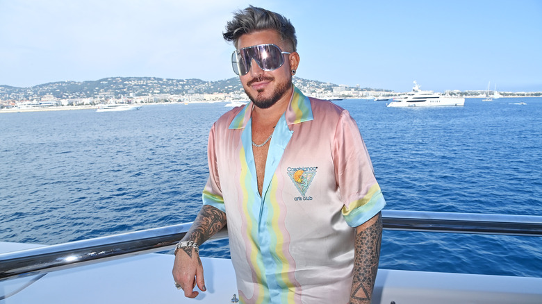 Lambert on boat at party hosted by Rebel Wilson