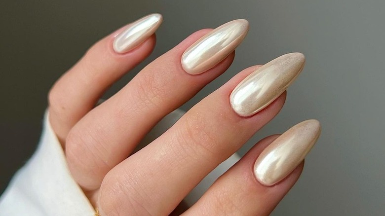 A close up of warm colored nails