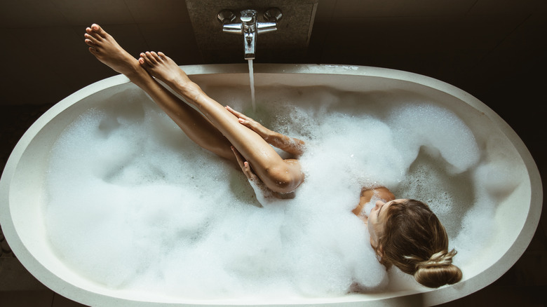 woman taking a bath