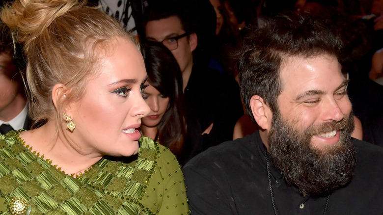 Adele and Simon Konecki talking