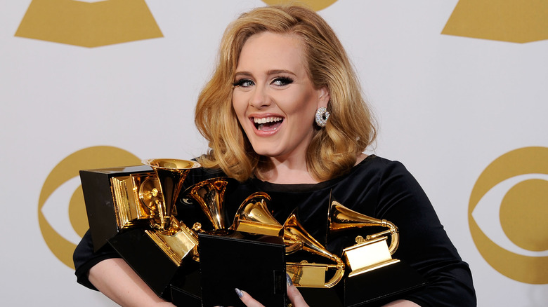 Adele with her Grammy Awards