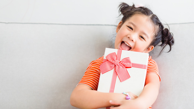 little girl with present 