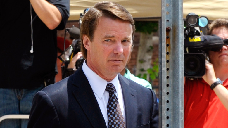 John Edwards walking away from cameras