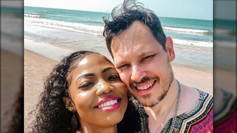 interracial age gap couple on beach