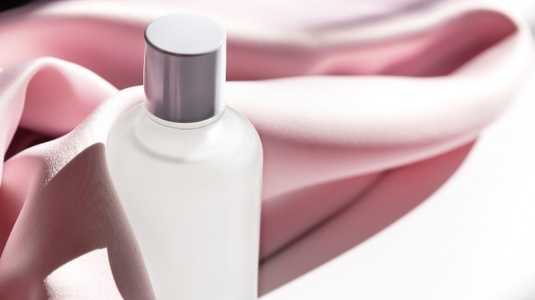 bottle skincare pink towel