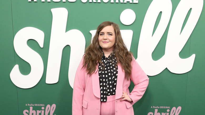 Aidy Bryant wearing a pink suit