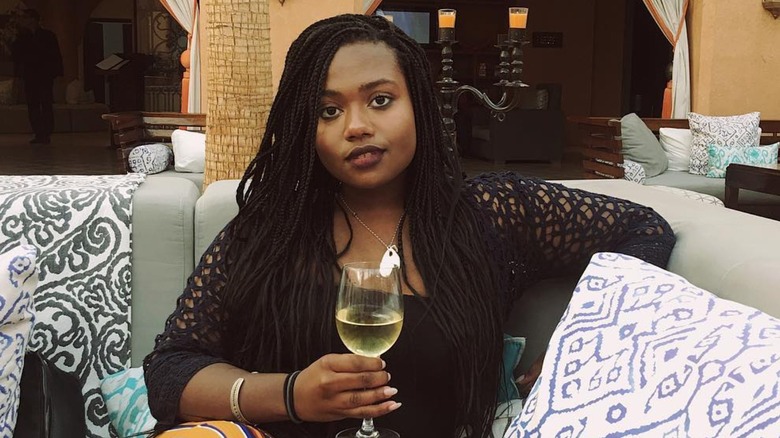 Leila Roker drinking wine in Morocco